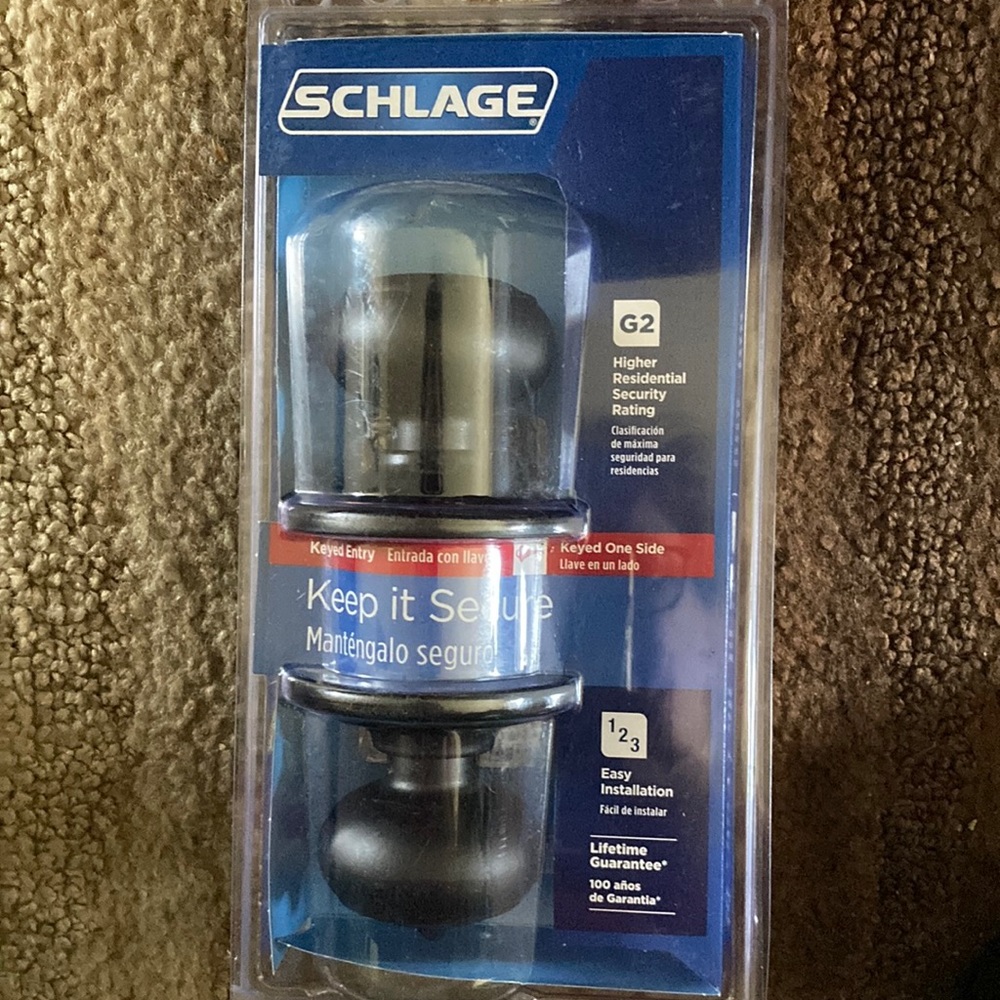 SCHLAGE G2 Security black doorknobs. New and never used. Key on one side.